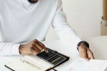 Person with a calculator