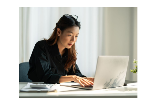 Woman filing annual accounts online