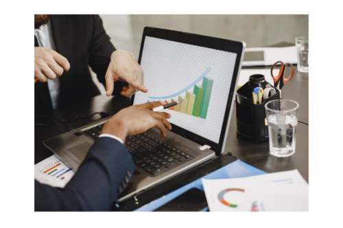 A man using a cash flow forecasting software