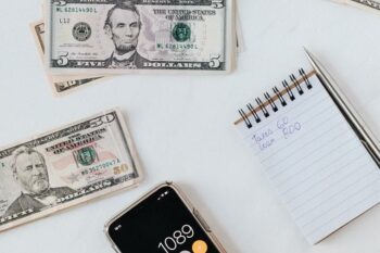 Hand typing into calculator